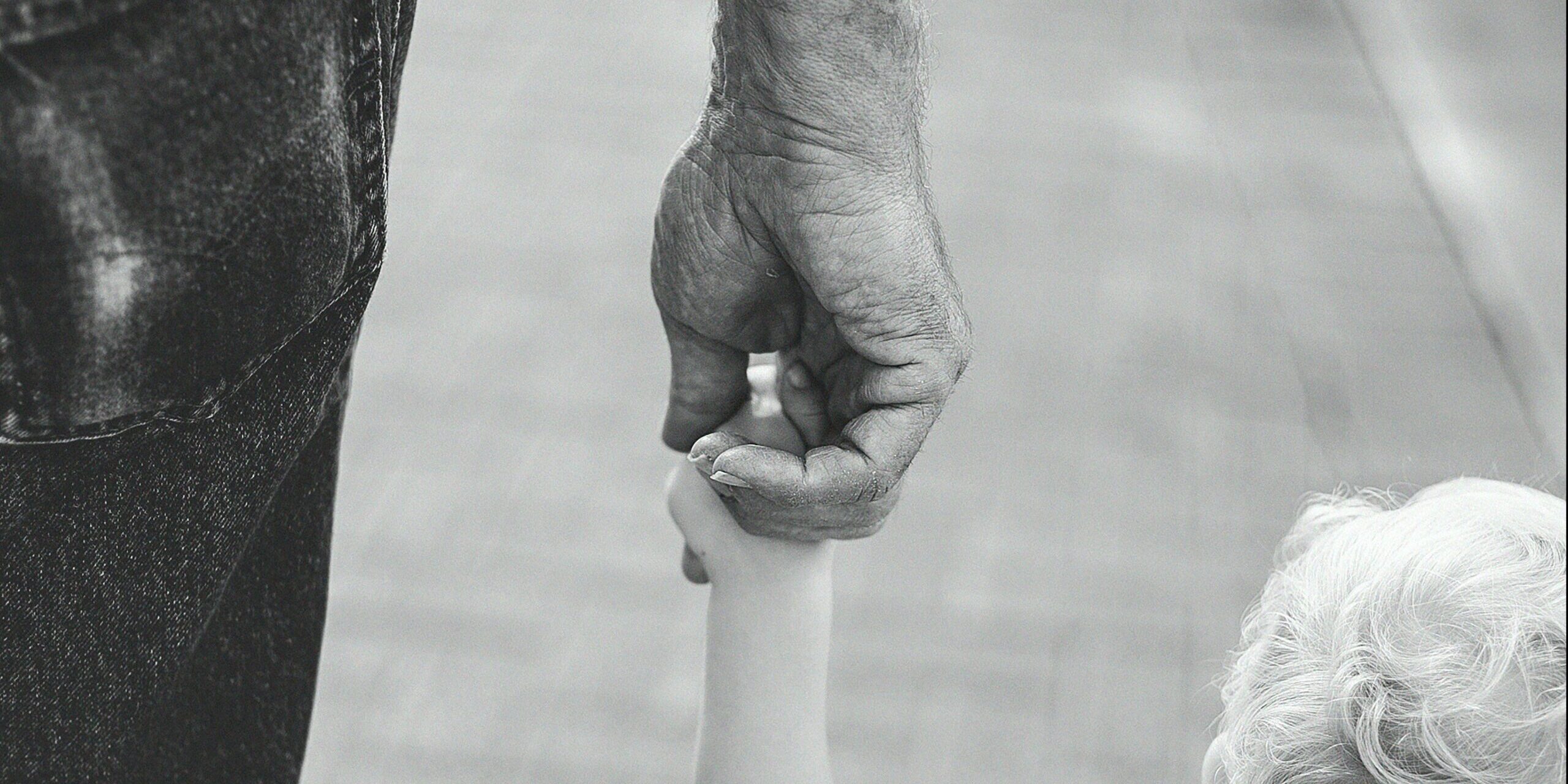 Father-child-holding-hands-e1565962659637