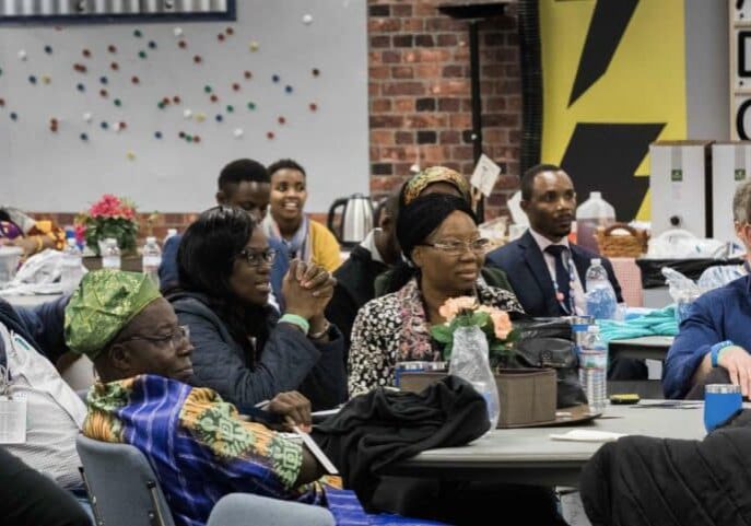 Leaders sitting at tables